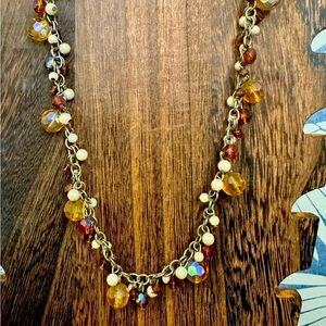 Pearl, red amber, iridescent beaded necklace.